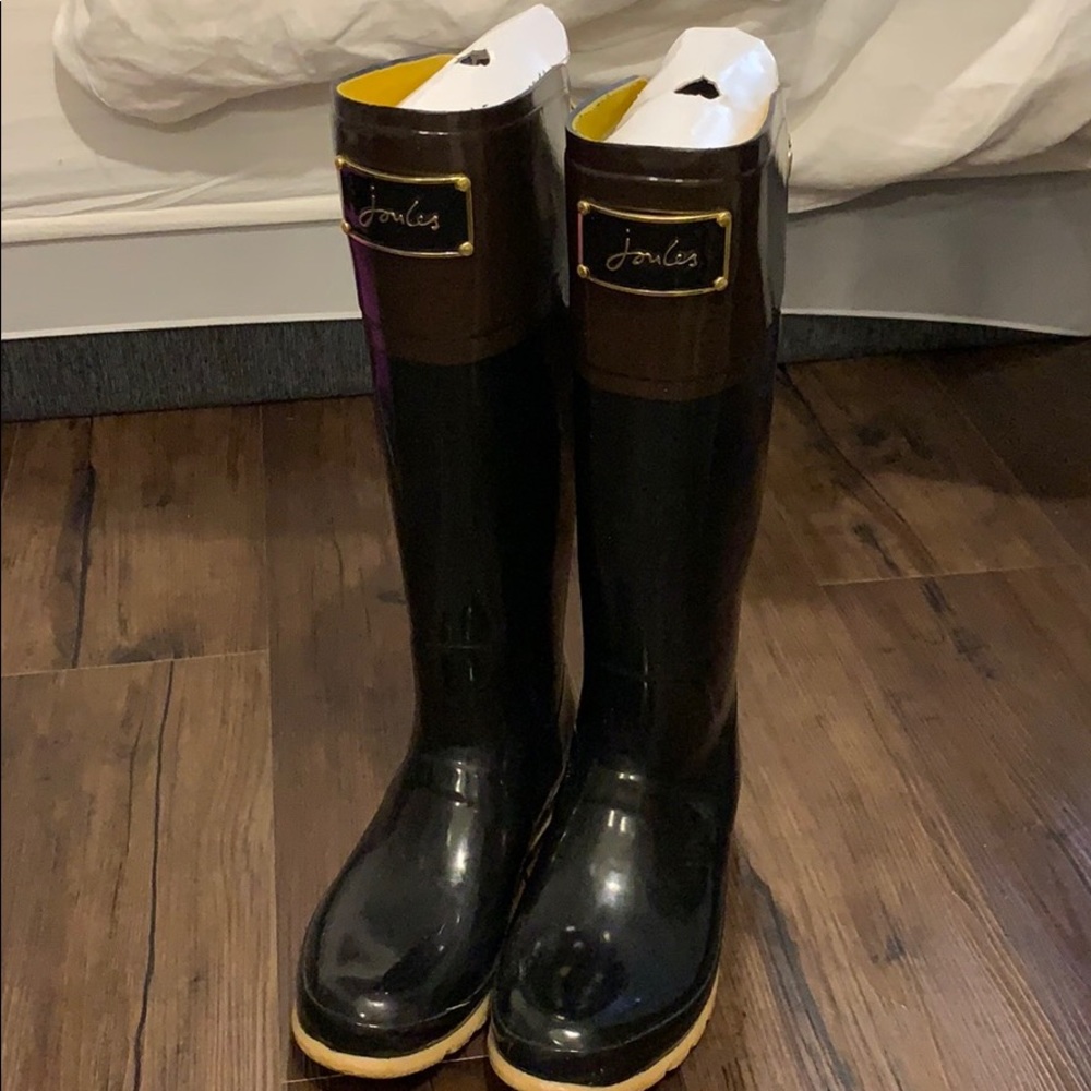 Black and brown rain boots